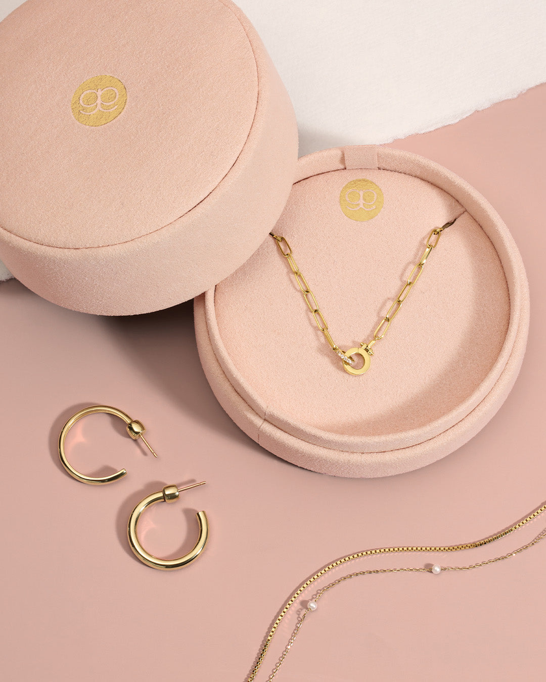 gift box with gold hoops and necklace