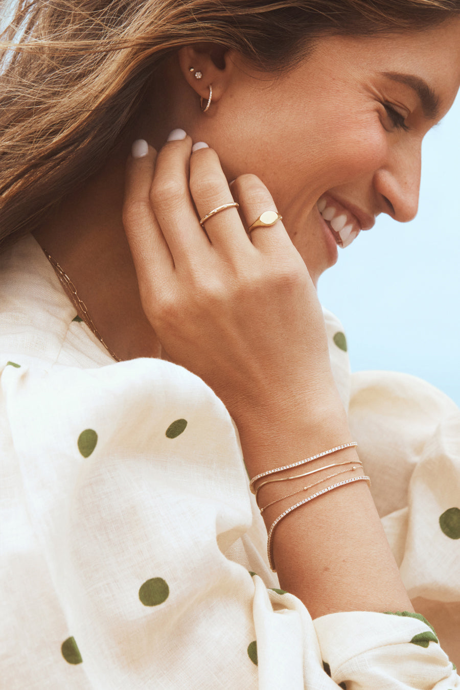 Woman wearing Micro Mini Venice Bracelet || option::14k Solid Gold, 6.5 in. || set::14k-gold-newport-bracelet-stl