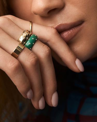 woman wearing bold statement rings